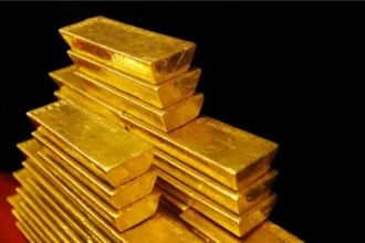 Prețul aurului în scădere după atingerea unui maxim al ultimelor două luni, pe fondul tensiunilor dintre Israel și Iran