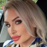 O avocată, membră PNL Sector 1, și un fals general SIE, prinși în flagrant cu 60.000 de euro de procurorii DNA